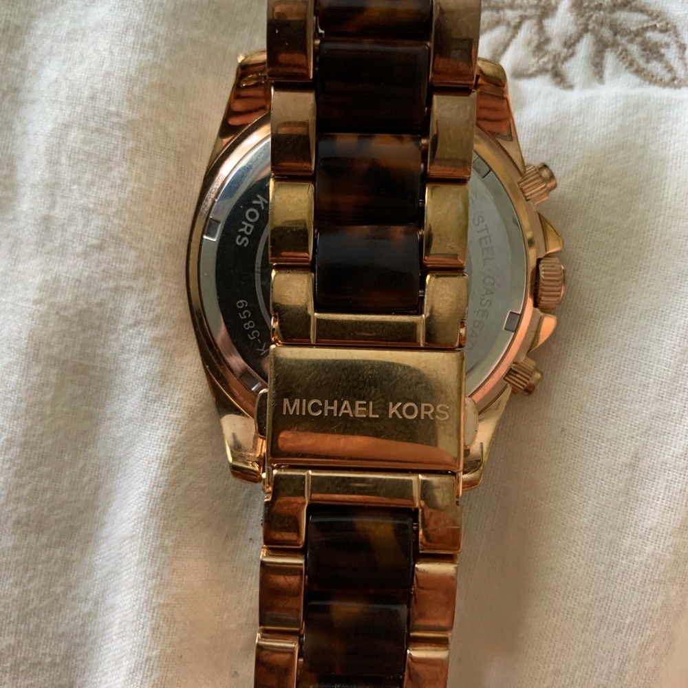 Michael kors watch, crack in face